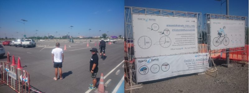 広大な駐車場とレギュレーション看板。